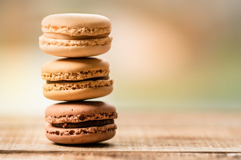 Close-up of stacked macarons showcasing their delicious textures and colors.